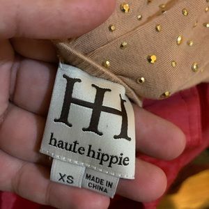 High low dress with golden charms.